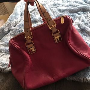 Michael Kors Fuchsia colored leather bag